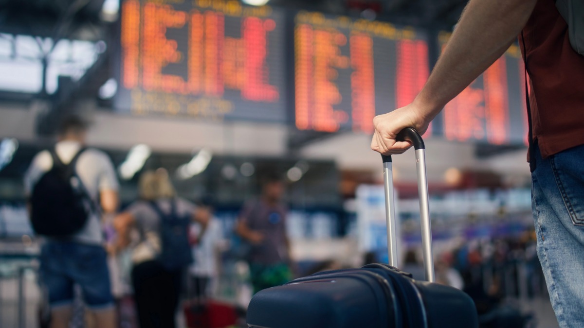 passeggero bagaglio a mano aeroporto